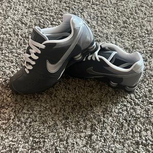 8.5 Womans gray suede Nike shocks